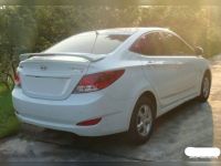 Спойлер со стопом Hyundai Solaris 